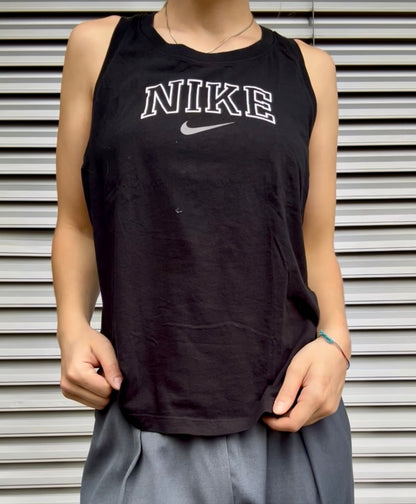 Model wears Secondhand black and white cotton Nike Top with Racerback 