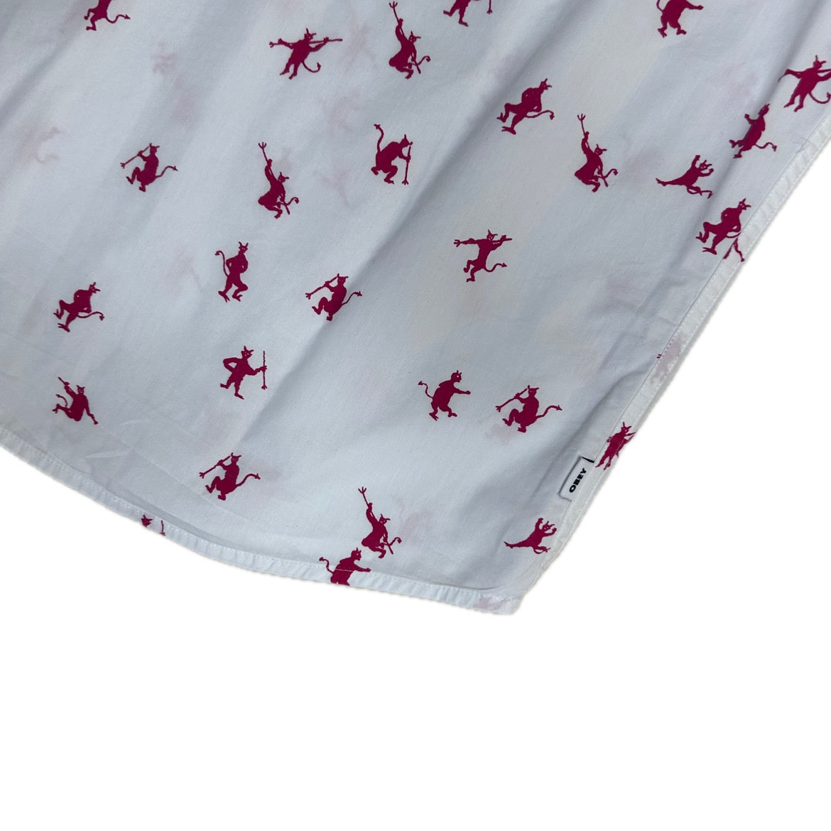 Secondhand white cotton Obey Shirt with short sleeves and red devil print 
